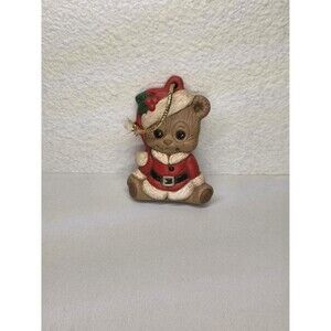 Collectible Vintage teddy bear wearing a Santa suit ceramic Christmas ornament